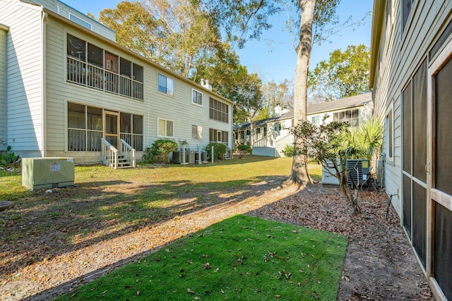 view of yard featuring a sunroom