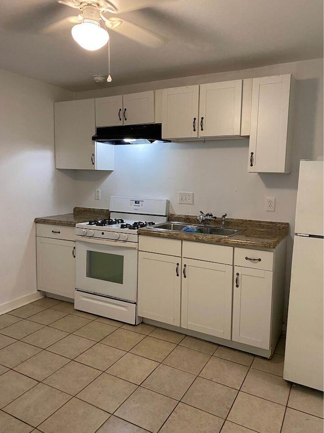 kitchen with white cabinetry, sink, ceiling fan, white appliances, and light tile patterned floors