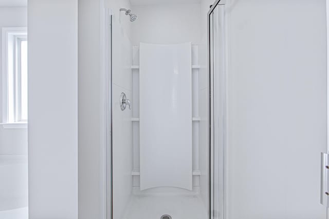 bathroom with a stall shower