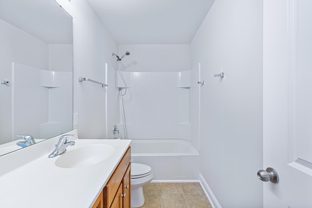 bathroom featuring bathtub / shower combination, baseboards, vanity, and toilet