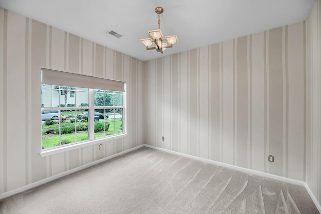 1445 Ashley Gardens Blvd, Charleston, SC 29414 - carpeted spare room featuring a chandelier, baseboards, and wallpapered walls