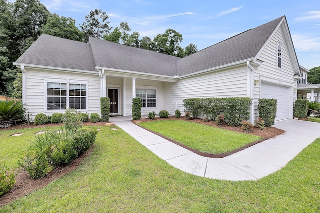 1445 Ashley Gardens Blvd, Charleston, SC 29414 - view of front of house with driveway, a front yard, and a shingled roof