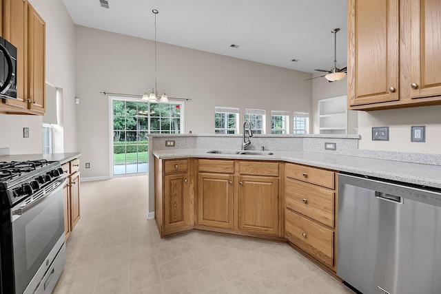 1445 Ashley Gardens Blvd, Charleston, SC 29414 - kitchen with appliances with stainless steel finishes, a sink, a chandelier, ceiling fan, and a peninsula