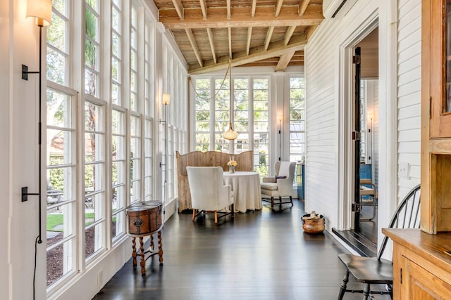 sunroom / solarium featuring vaulted ceiling with beams, a wall mounted AC, and wood ceiling