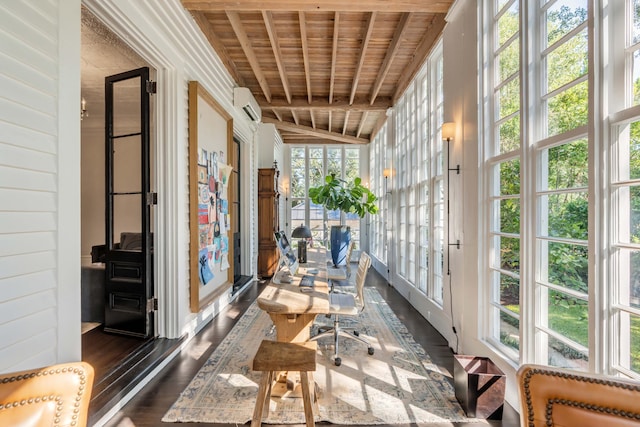 sunroom / solarium with a wall mounted air conditioner, vaulted ceiling with beams, and wooden ceiling