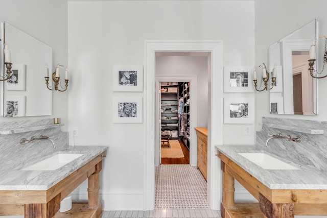 bathroom with tile patterned floors and sink