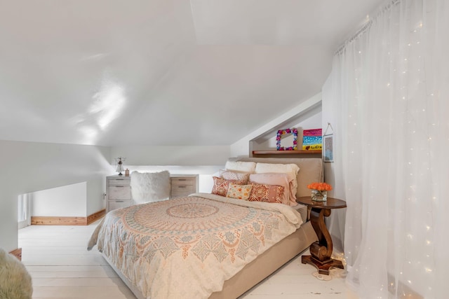 bedroom with vaulted ceiling