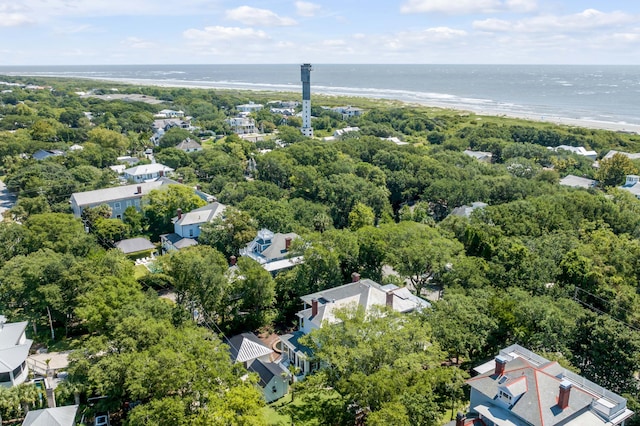 aerial view with a water view and a beach view