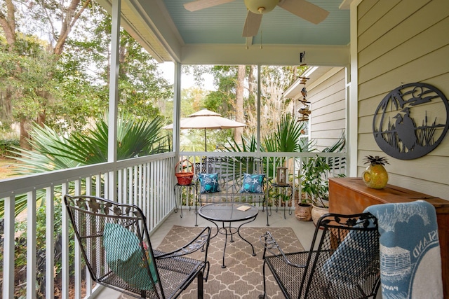 balcony featuring ceiling fan