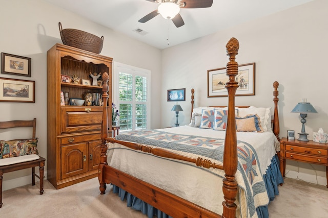 bedroom with ceiling fan and light colored carpet