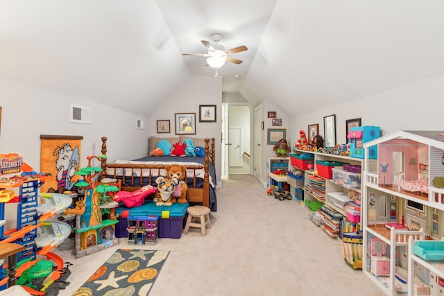 game room with ceiling fan, light colored carpet, and vaulted ceiling