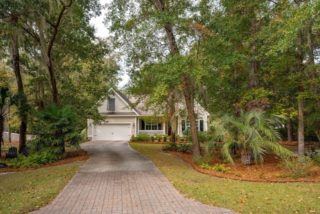 obstructed view of property featuring a garage