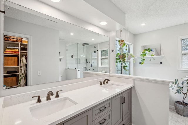 334 Mossy Oak Way, Mount Pleasant, SC 29464 - full bath with a stall shower, double vanity, recessed lighting, marble finish floors, and a walk in closet