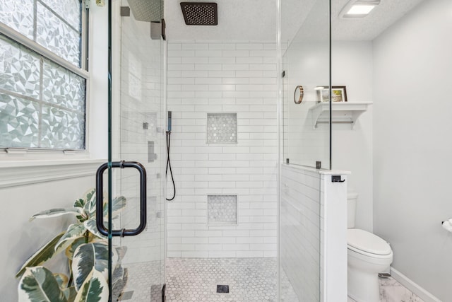334 Mossy Oak Way, Mount Pleasant, SC 29464 - bathroom with toilet, a stall shower, marble look tile flooring, and plenty of natural light