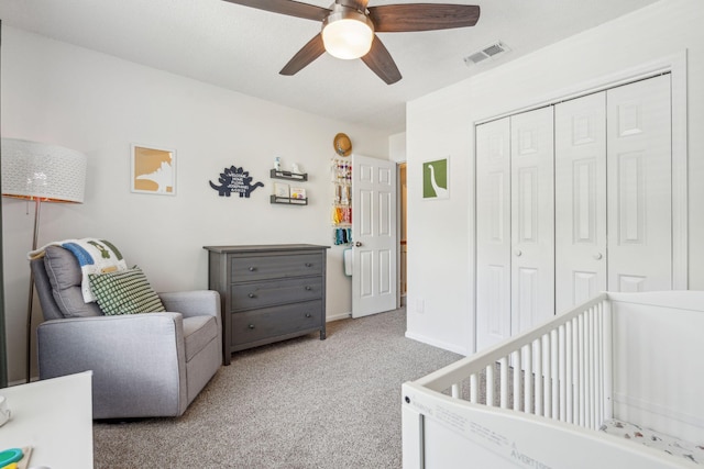 334 Mossy Oak Way, Mount Pleasant, SC 29464 - carpeted bedroom with a closet, a crib, ceiling fan, and baseboards