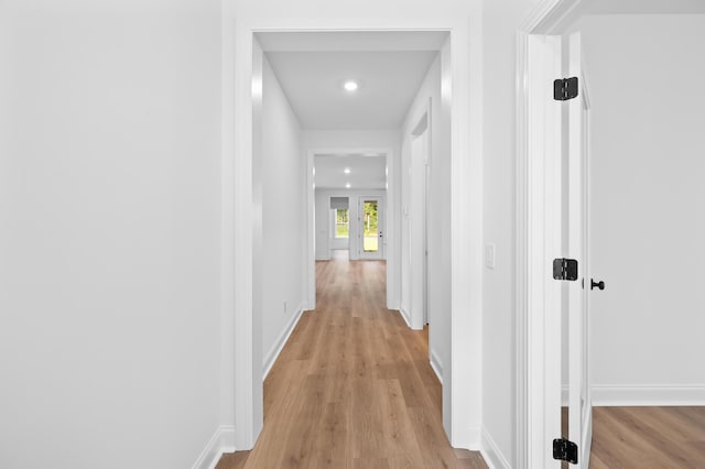 hall featuring light hardwood / wood-style floors