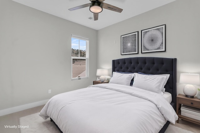 bedroom with carpet flooring, ceiling fan, visible vents, and baseboards