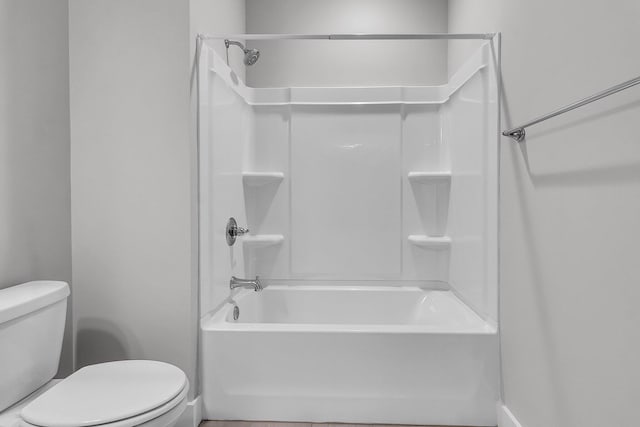 full bathroom with tub / shower combination and toilet