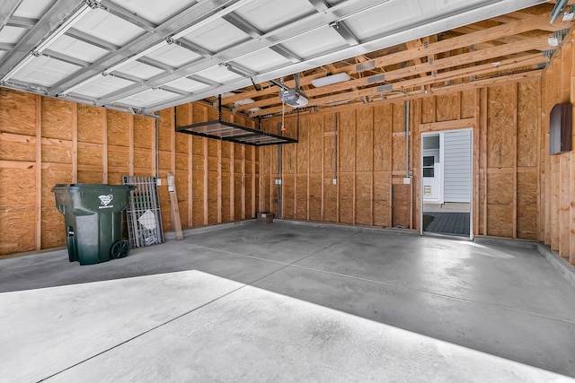 garage featuring a garage door opener