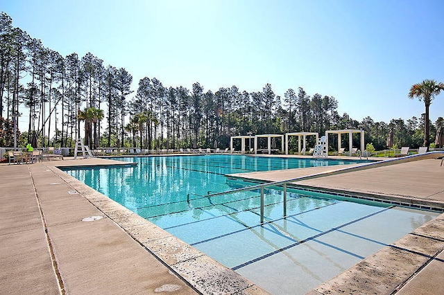 pool with a patio area