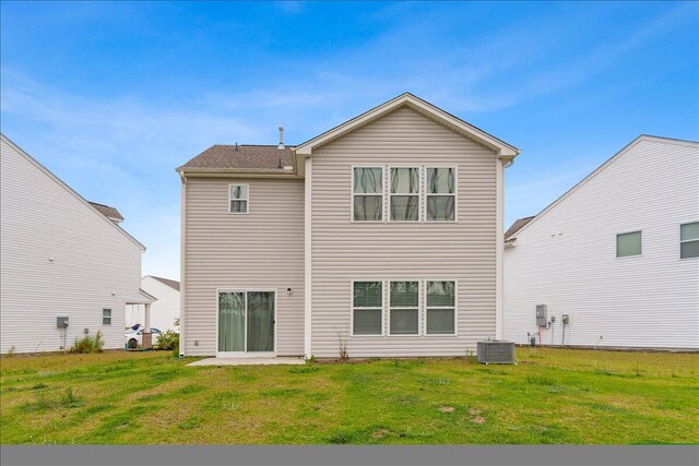 525 Purple Finch Rd, Summerville, SC 29486 - back of house featuring a lawn and central AC unit
