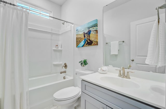 bathroom featuring toilet, vanity, and shower / bath combination with curtain
