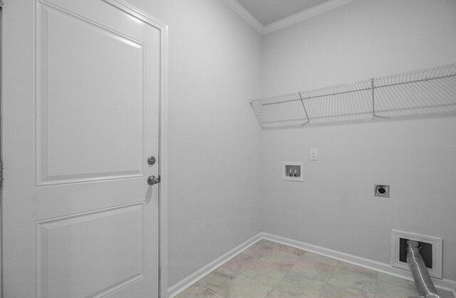 laundry room featuring electric dryer hookup, ornamental molding, hookup for a washing machine, and baseboards