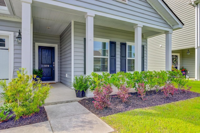 property entrance featuring covered porch