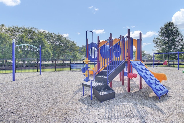 community jungle gym with fence