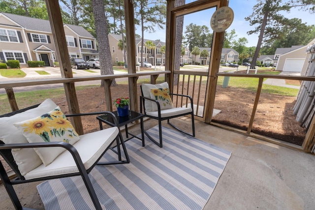 sunroom with a residential view