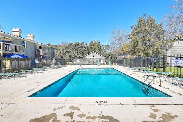 view of pool featuring a patio area