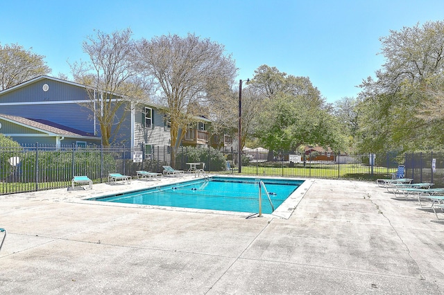 view of swimming pool featuring a patio