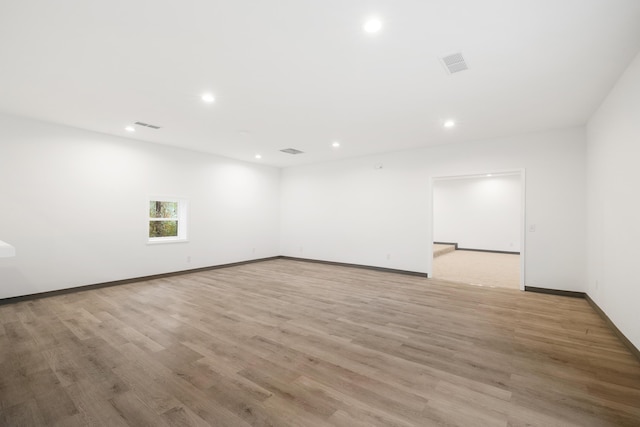 spare room with light wood-type flooring