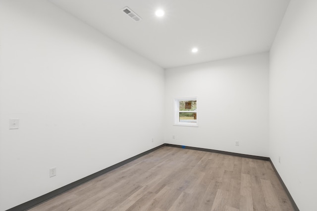 empty room featuring light hardwood / wood-style floors