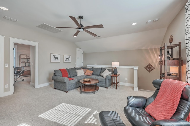 carpeted living room featuring lofted ceiling and ceiling fan