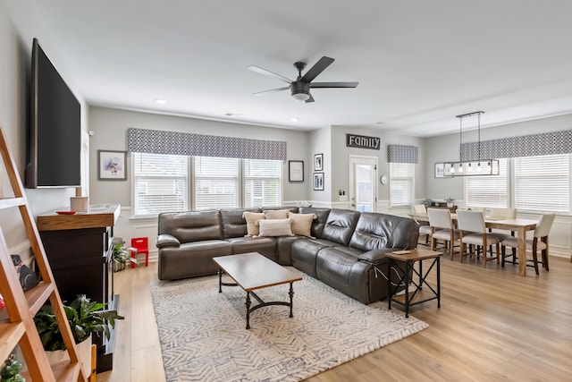 627 Macintyre Cir, Summerville, SC 29486 - living room with a ceiling fan, light wood-style flooring, a chandelier, and recessed lighting