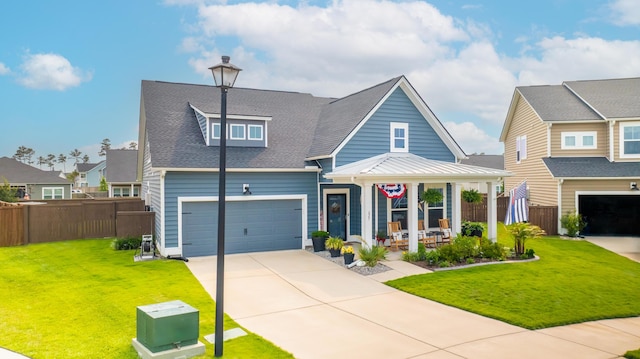 627 Macintyre Cir, Summerville, SC 29486 - view of front facade with driveway, a garage, covered porch, and roof with shingles