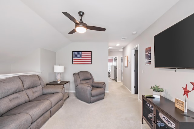 627 Macintyre Cir, Summerville, SC 29486 - living room featuring light carpet, ceiling fan, vaulted ceiling, and baseboards