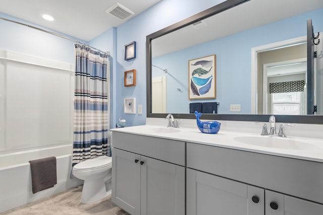 627 Macintyre Cir, Summerville, SC 29486 - bathroom featuring double vanity, toilet, shower / tub combo, and tile patterned floors