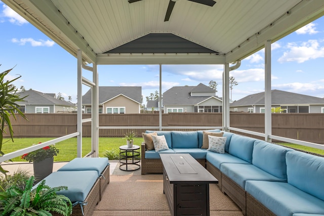 627 Macintyre Cir, Summerville, SC 29486 - sunroom / solarium with outdoor lounge area, lofted ceiling, a ceiling fan, a residential view, and plenty of natural light