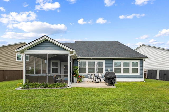 627 Macintyre Cir, Summerville, SC 29486 - rear view of property featuring a sunroom, roof with shingles, and a patio