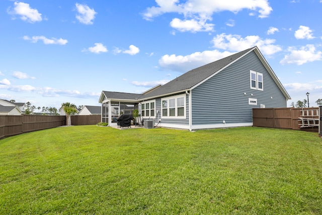 627 Macintyre Cir, Summerville, SC 29486 - rear view of property featuring a sunroom, central AC, and roof with shingles