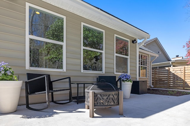 view of patio / terrace featuring fence