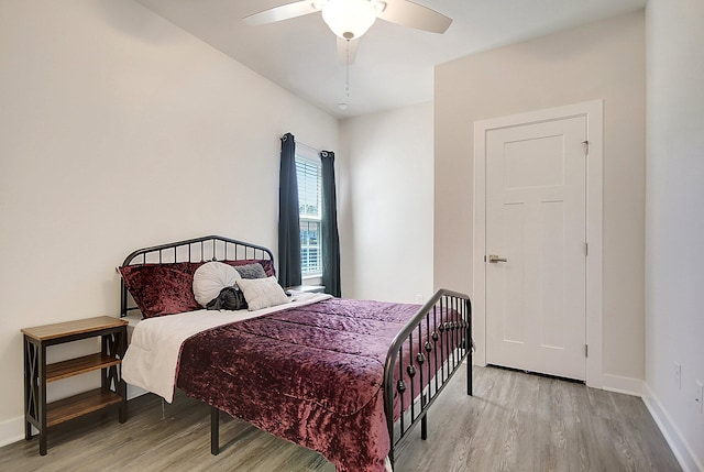 bedroom featuring ceiling fan and light wood-type flooring