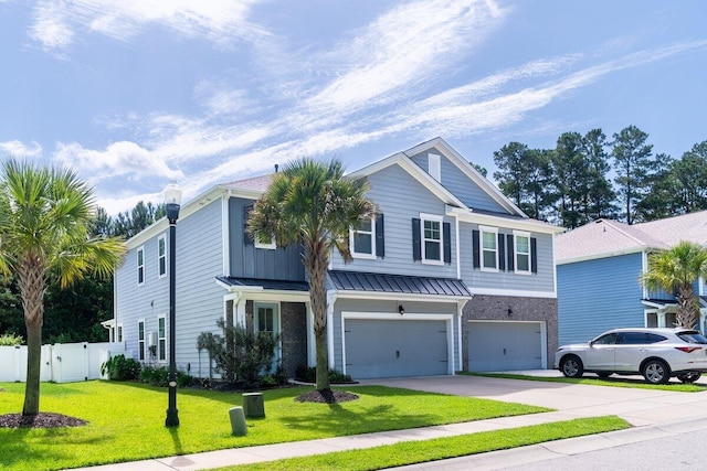 1630 Mermentau St, Mount Pleasant, SC 29466 - view of front of home with an attached garage, concrete driveway, a standing seam roof, and a metal roof