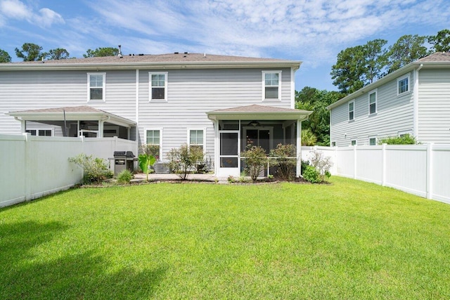 1630 Mermentau St, Mount Pleasant, SC 29466 - rear view of house featuring a sunroom and a fenced backyard