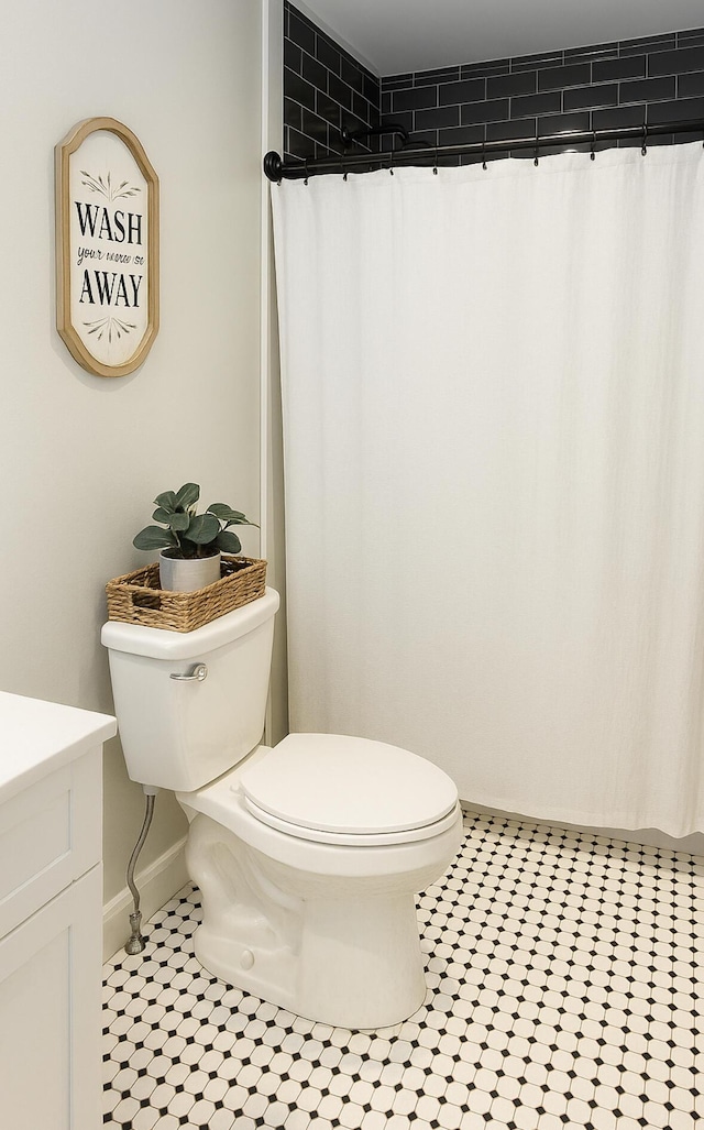 6061 Old Number Six Hwy, Elloree, SC 29047 - full bathroom with toilet, vanity, tile patterned floors, baseboards, and a shower with shower curtain
