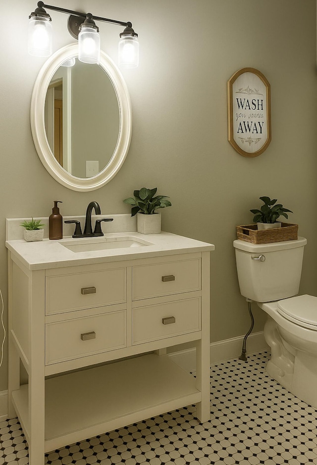 6061 Old Number Six Hwy, Elloree, SC 29047 - bathroom featuring vanity, toilet, and baseboards