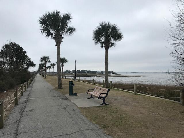 view of community with a water view