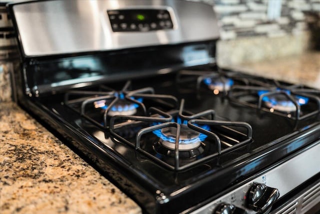 interior details with stainless steel gas range